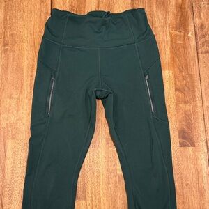 Athleta Forest Green High-Rise Leggings with Zippered Pockets